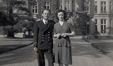 Phil and friend in front of President Hall