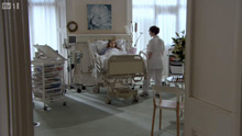 Recovering patient in a hospital room, either the Runnymede Room or one of the President Hall offices. 